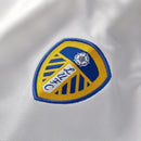 Camisa Leeds I 25/26 - Torcedor Adidas Feminina - Branca com detalhes em azul e amarelo