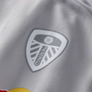 Jaqueta Corta-Vento Leeds United 25/26 - Adidas - Cinza
