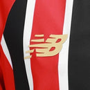 Camisa São Paulo II 25/26 - Torcedor New Balance Feminina - Vermelha e preta