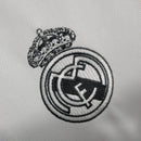 Camisa Real Madrid Polo 23/24 - Torcedor Adidas Masculina - Branca com detalhes em preto