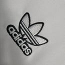 Camisa Real Madrid Polo 23/24 - Torcedor Adidas Masculina - Branca com detalhes em preto