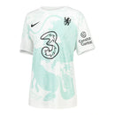 Camisa Chelsea Pré-jogo Edição especial Ano do Cavalo 26/27 - Torcedor Nike Feminina - Branca com detalhes em verde