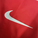 Jaqueta Corta-Vento Internacional 23/24 - Masculina Nike - Vermelha com detalhes em branco