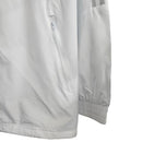 Jaqueta Corta-Vento Real Madrid 23/24 - Masculina Adidas - Branca com listras pretas