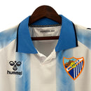 Camisa Málaga I 23/24 - Torcedor Hummel Masculina - Branca com detalhes em azul