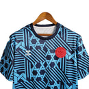 Camisa Dinamarca Treino 23/24 - Torcedor Hummel Masculina - Azul com detalhes em preto e vermelho