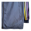 Jaqueta Corta-Vento Real Madrid 23/24 - Masculina Adidas - Azul com detalhes em amarelo