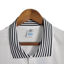 Camisa Real Madrid Polo 23/24 - Torcedor Adidas Masculina - Branca com detalhes em preto