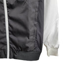 Jaqueta Corta-Vento Internacional 24/25 - Masculina Nike - Branca e preta