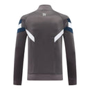Jaqueta Corta-Vento Real Madrid 25/26 - Masculina Adidas - Cinza