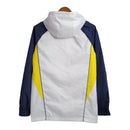 Jaqueta Corta-Vento Real Madrid 23/24 - Masculina Adidas - Branca com detalhes em azul e amarelo