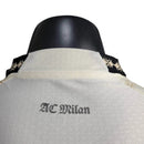 Camisa AC Milan Edição especial 24/25 manga longa - Jogador Puma Masculina - Bege com detalhes em preto