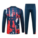 Conjunto Paris Saint-Germain Pré-jogo 24/25 - Masculino Nike - Azul com detalhes em vermelho e branco
