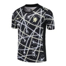 Camisa Chelsea Pré-jogo 25/26 - Torcedor Nike Masculina - Preta com detalhes em amarelo