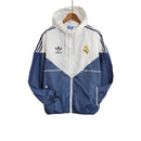 Jaqueta Corta-Vento Real Madrid 23/24 - Masculina Adidas - Azul e branca