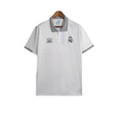 Camisa Real Madrid Polo 23/24 - Torcedor Adidas Masculina - Branca com detalhes em preto
