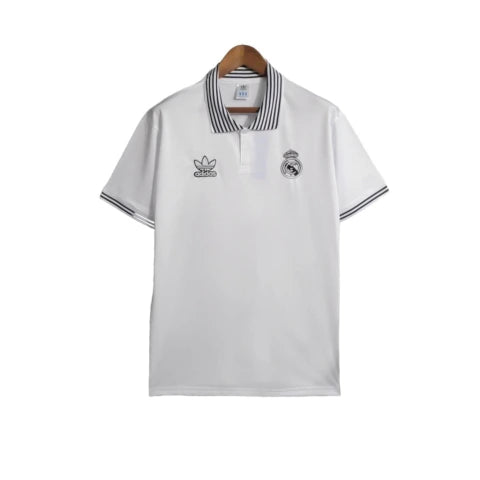 Camisa Real Madrid Polo 23/24 - Torcedor Adidas Masculina - Branca com detalhes em preto