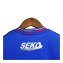 Kit Infantil Rangers Clube I 23/24 - Castore - Azul com detalhes em branco